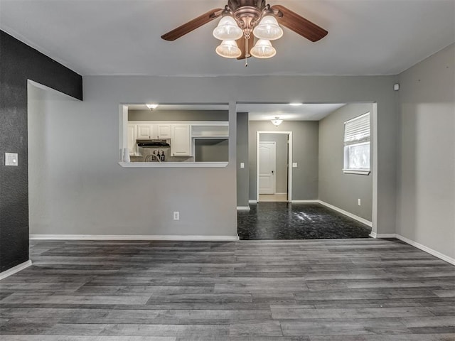 528 Sweetbough St, Jones, OK 73049 - unfurnished living room with a ceiling fan and wood finished floors