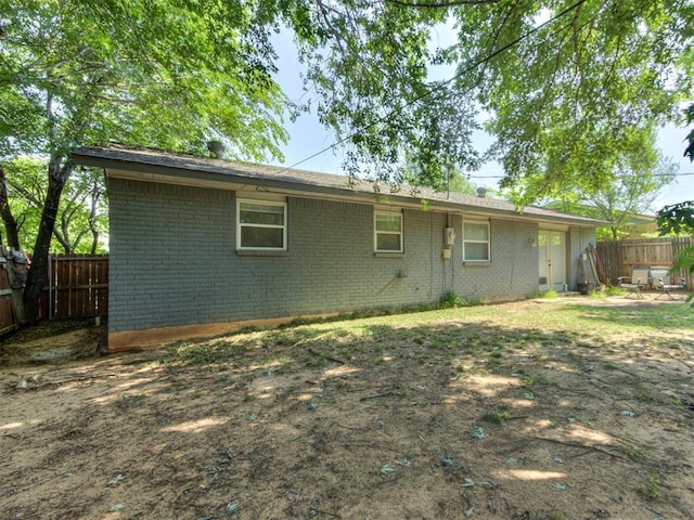 528 Sweetbough St, Jones, OK 73049 - back of property with brick siding and a fenced backyard