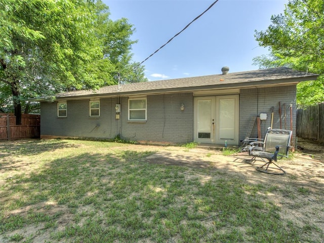 528 Sweetbough St, Jones, OK 73049 - rear view of property with brick siding