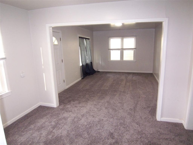 419 W Pulaski St, Shawnee, OK 74804 - carpeted spare room featuring baseboards