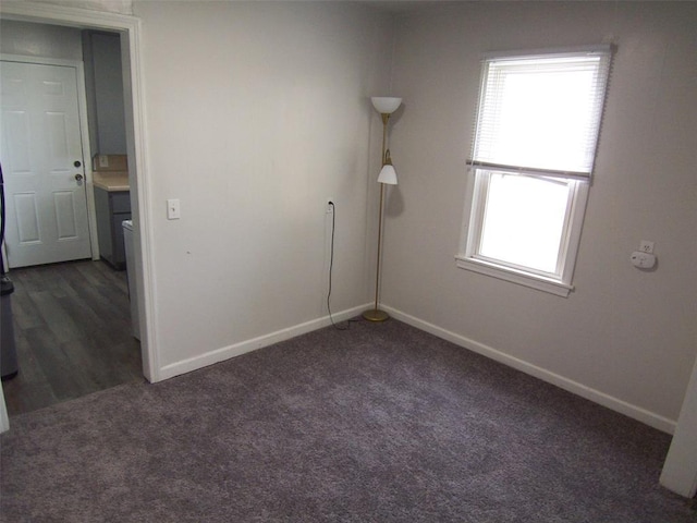 419 W Pulaski St, Shawnee, OK 74804 - empty room featuring baseboards and carpet