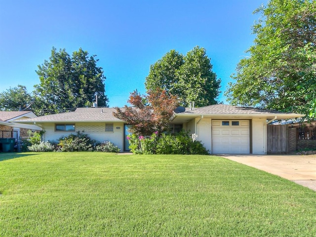 2632 SW 55th St, Oklahoma City, OK 73119 - ranch-style house featuring an attached garage, concrete driveway, and brick siding