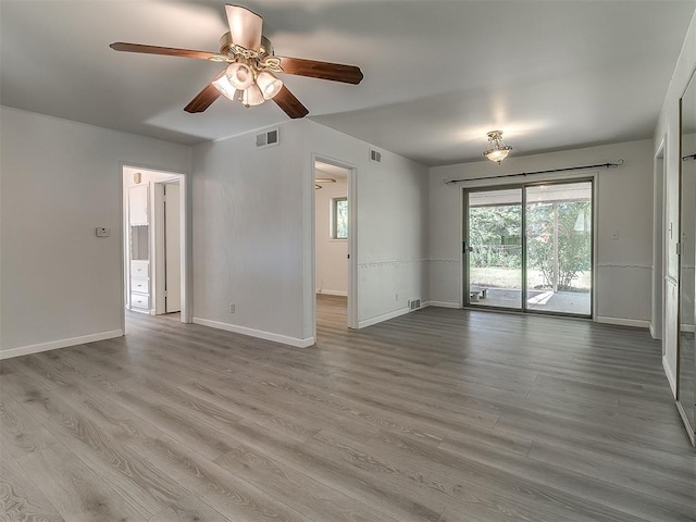 2632 SW 55th St, Oklahoma City, OK 73119 - spare room with ceiling fan and wood finished floors