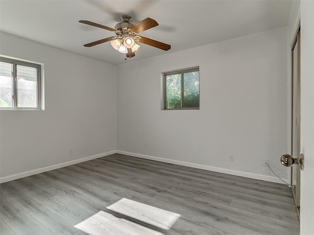 2632 SW 55th St, Oklahoma City, OK 73119 - unfurnished room featuring ceiling fan and wood finished floors
