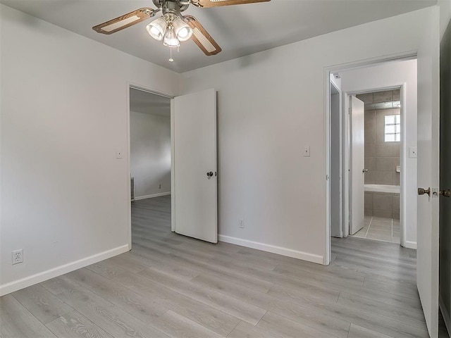 2632 SW 55th St, Oklahoma City, OK 73119 - empty room featuring ceiling fan, light wood-type flooring, and attic access