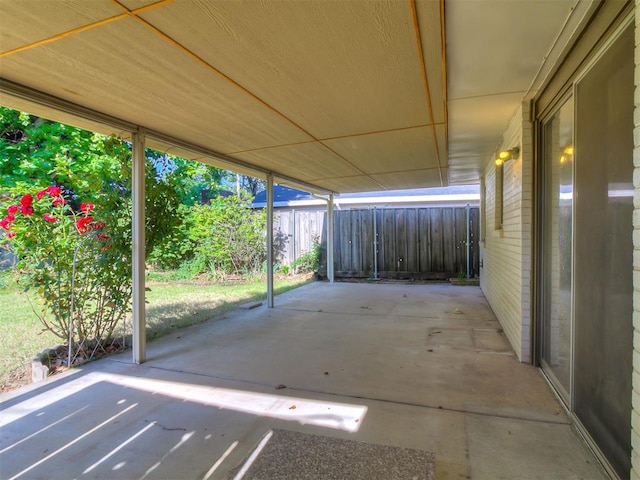 2632 SW 55th St, Oklahoma City, OK 73119 - view of patio featuring a carport