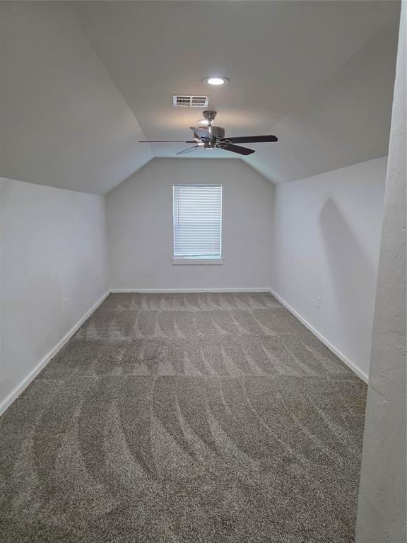 8813 Aaron Dr, Oklahoma City, OK 73132 - bonus room with a ceiling fan, carpet floors, and lofted ceiling