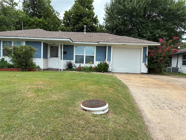 3305 N Mueller Ave, Bethany, OK 73008 - ranch-style house featuring an attached garage, driveway, a front yard, and a shingled roof