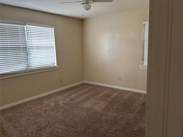 3305 N Mueller Ave, Bethany, OK 73008 - carpeted spare room with ceiling fan and baseboards
