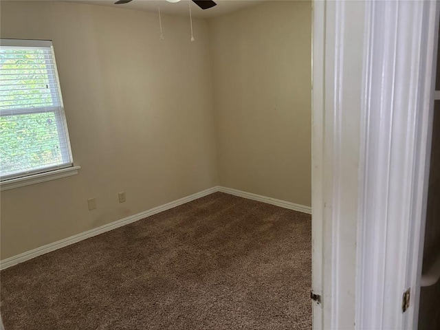 3305 N Mueller Ave, Bethany, OK 73008 - empty room with dark colored carpet and a ceiling fan