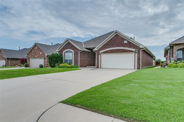 1308 River Birch Dr, Yukon, OK 73099 - single story home with an attached garage, brick siding, a front yard, and concrete driveway