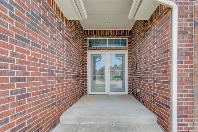1308 River Birch Dr, Yukon, OK 73099 - property entrance with french doors and brick siding