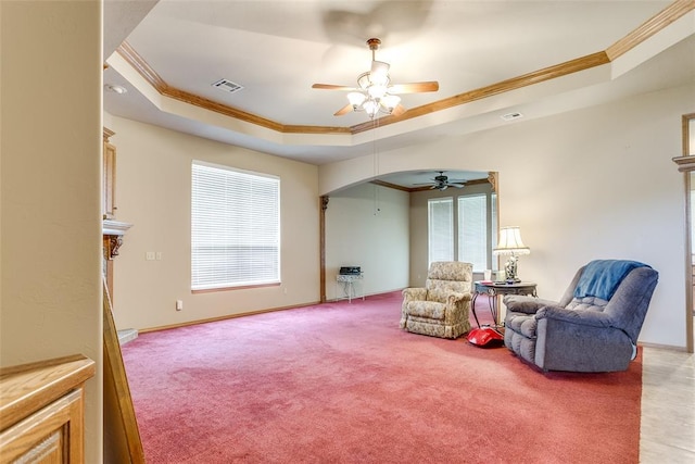1308 River Birch Dr, Yukon, OK 73099 - sitting room with a tray ceiling, ornamental molding, a ceiling fan, healthy amount of natural light, and light colored carpet