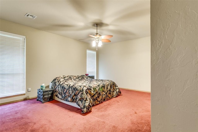 1308 River Birch Dr, Yukon, OK 73099 - carpeted bedroom featuring ceiling fan