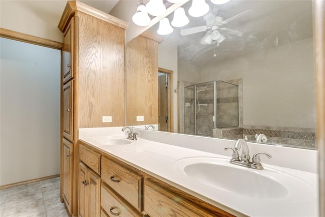 1308 River Birch Dr, Yukon, OK 73099 - bathroom with double vanity, a stall shower, and ceiling fan