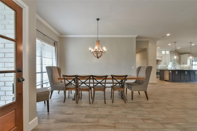 3019 Winding Creek Ln, Piedmont, OK 73078 - dining space with crown molding, a chandelier, light wood-style flooring, and recessed lighting