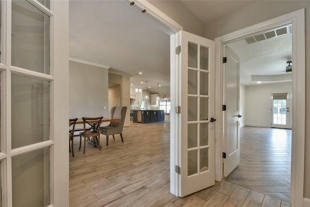 3019 Winding Creek Ln, Piedmont, OK 73078 - hallway featuring light wood-style flooring and baseboards