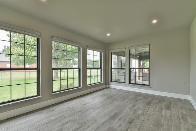 3019 Winding Creek Ln, Piedmont, OK 73078 - unfurnished sunroom with wood finished floors and recessed lighting