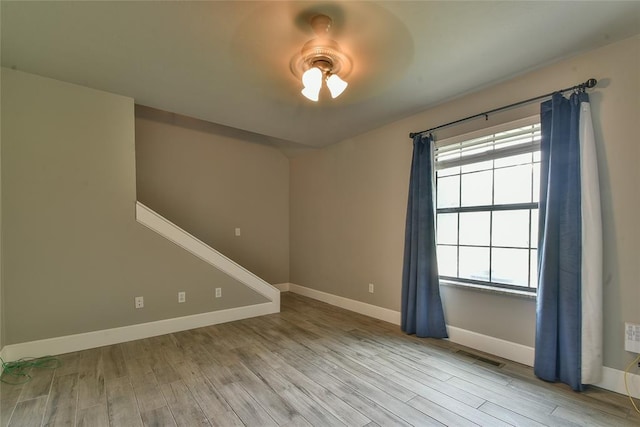 3019 Winding Creek Ln, Piedmont, OK 73078 - spare room with wood finished floors and baseboards