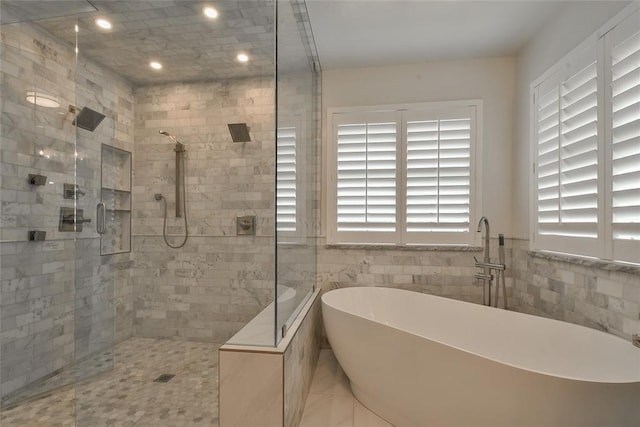3019 Winding Creek Ln, Piedmont, OK 73078 - full bath with a shower stall, a freestanding tub, recessed lighting, and tile walls