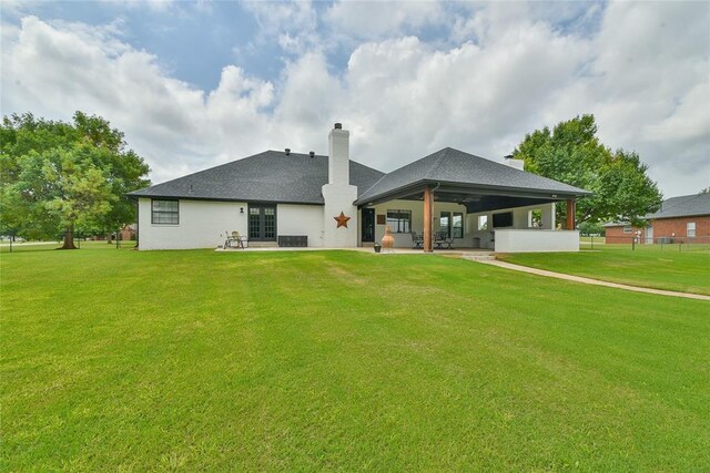 3019 Winding Creek Ln, Piedmont, OK 73078 - back of house with french doors, a patio, a chimney, and a yard
