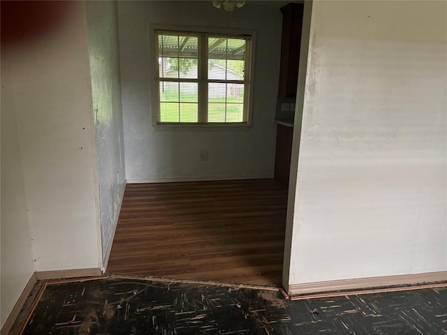 3307 N Mueller Ave, Bethany, OK 73008 - hall featuring wood finished floors and baseboards