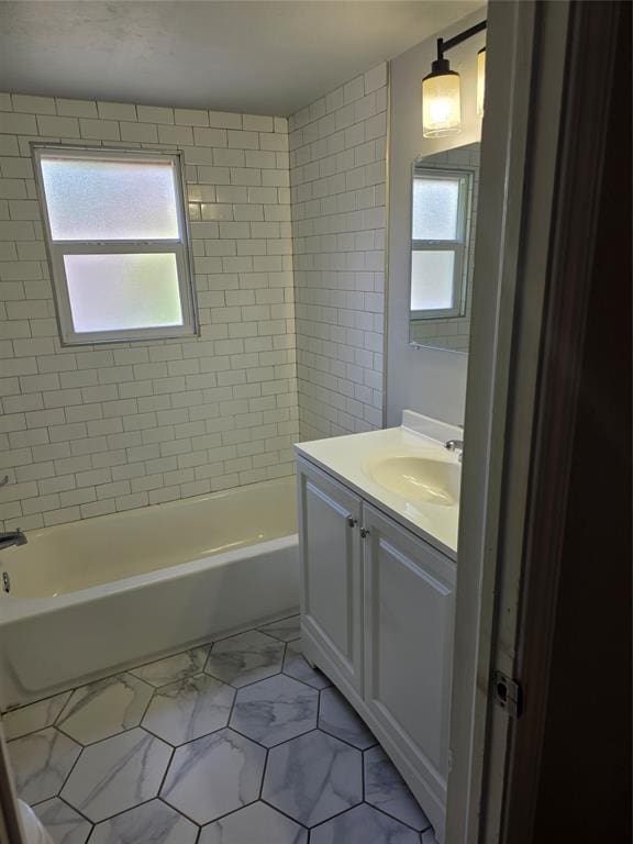 6101 NW 48th St, Warr Acres, OK 73122 - full bathroom with vanity, marble look tile flooring, and shower / bath combination