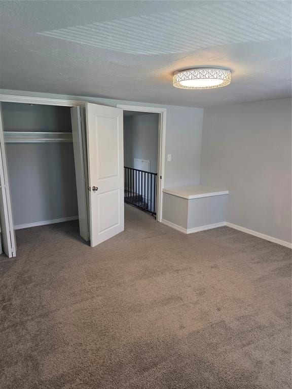 6101 NW 48th St, Warr Acres, OK 73122 - unfurnished bedroom featuring carpet flooring and a closet