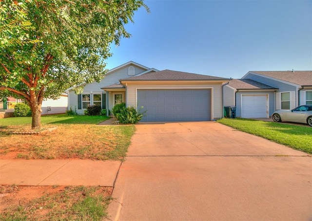 1709 NW 147th St, Edmond, OK 73013 - view of front facade with a garage, a front lawn, and driveway