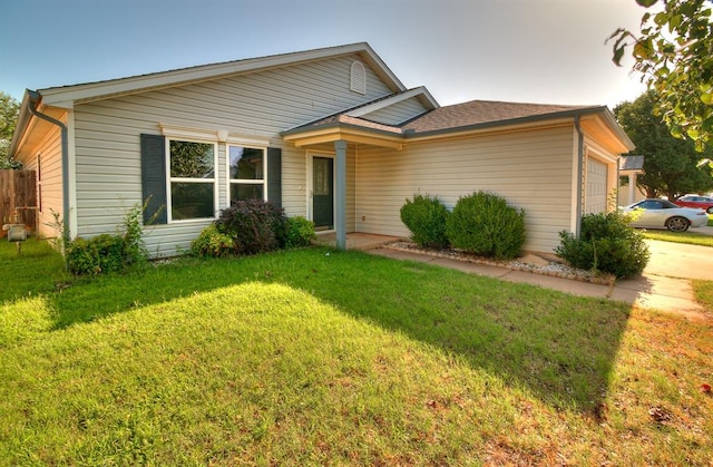 1709 NW 147th St, Edmond, OK 73013 - view of front of home with a garage and a front yard