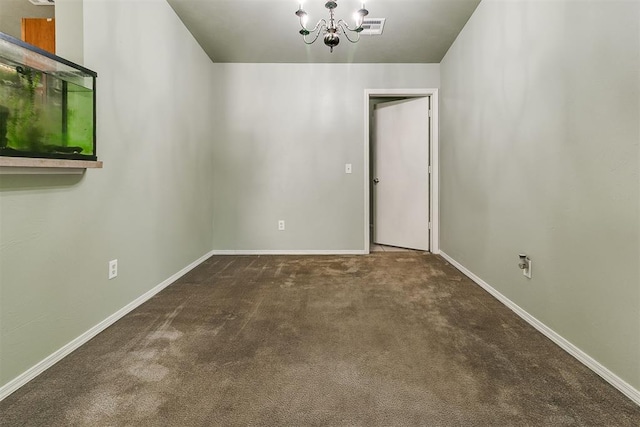 1709 NW 147th St, Edmond, OK 73013 - carpeted empty room with a chandelier and baseboards