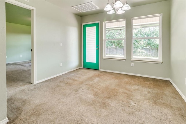 1709 NW 147th St, Edmond, OK 73013 - carpeted empty room featuring a chandelier and baseboards