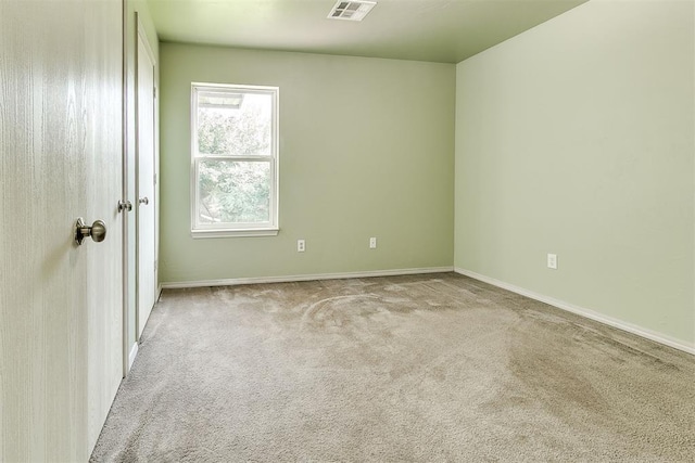 1709 NW 147th St, Edmond, OK 73013 - carpeted spare room with baseboards