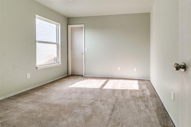 1709 NW 147th St, Edmond, OK 73013 - empty room featuring carpet and baseboards
