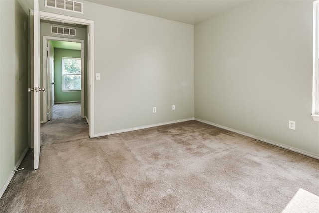 1709 NW 147th St, Edmond, OK 73013 - carpeted spare room featuring baseboards