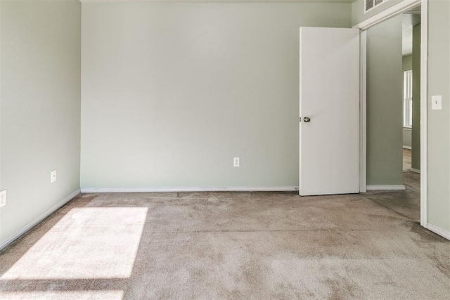 1709 NW 147th St, Edmond, OK 73013 - carpeted spare room featuring baseboards