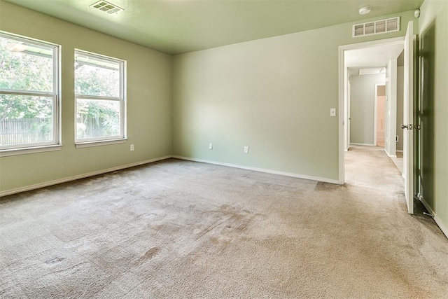 1709 NW 147th St, Edmond, OK 73013 - unfurnished room featuring light colored carpet and a smoke detector