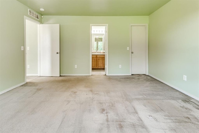 1709 NW 147th St, Edmond, OK 73013 - unfurnished bedroom with carpet and connected bathroom
