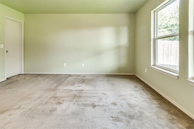 1709 NW 147th St, Edmond, OK 73013 - carpeted spare room with baseboards