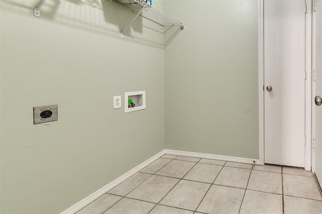 1709 NW 147th St, Edmond, OK 73013 - washroom featuring electric dryer hookup, washer hookup, and light tile patterned floors