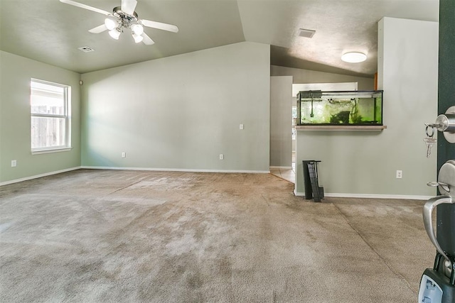1709 NW 147th St, Edmond, OK 73013 - unfurnished living room with lofted ceiling, carpet, and ceiling fan