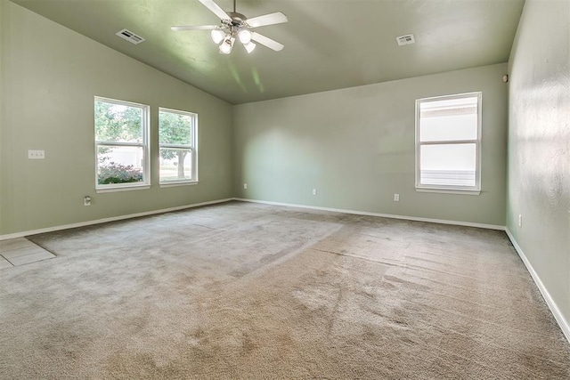 1709 NW 147th St, Edmond, OK 73013 - carpeted empty room featuring healthy amount of natural light, ceiling fan, and vaulted ceiling