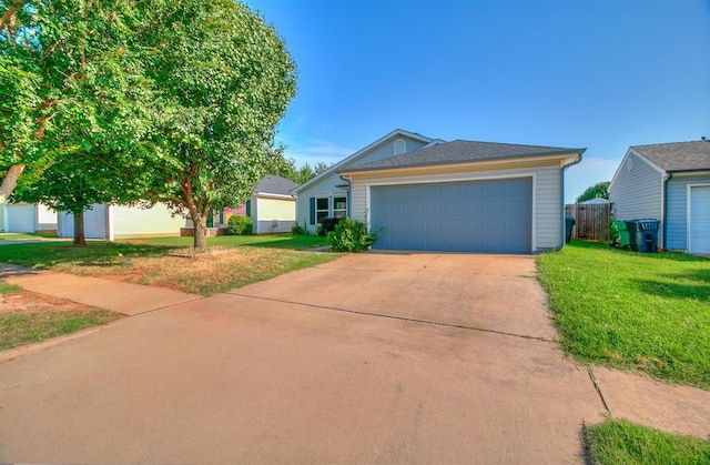 1709 NW 147th St, Edmond, OK 73013 - view of front of home featuring driveway and an attached garage