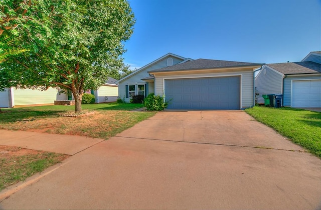 1709 NW 147th St, Edmond, OK 73013 - ranch-style home with driveway, a front yard, and a garage