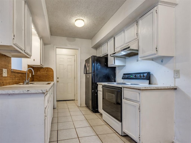 218 Windsor Way, Midwest City, OK 73110 - kitchen featuring electric stove, under cabinet range hood, a textured ceiling, and white cabinetry