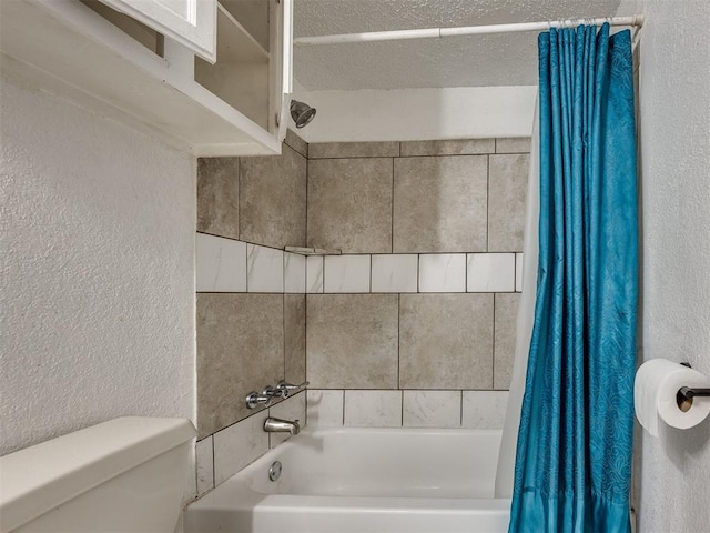 218 Windsor Way, Midwest City, OK 73110 - full bathroom featuring a textured wall and shower / bathtub combination with curtain