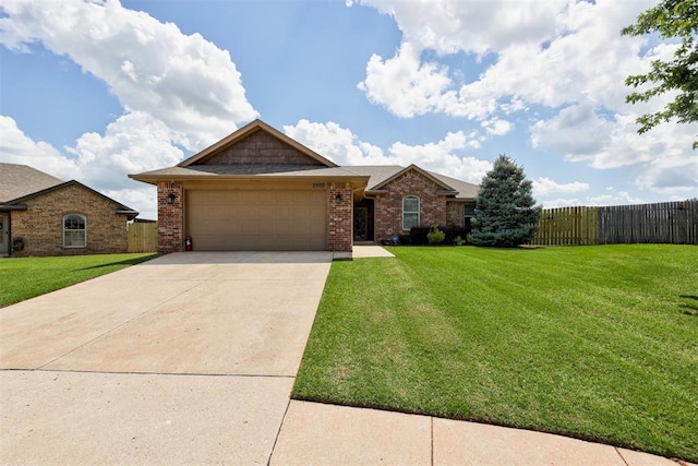 2500 SE 93rd St, Moore, OK 73160 - view of front of home featuring brick siding, a garage, and driveway