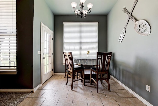 2500 SE 93rd St, Moore, OK 73160 - tiled dining room featuring a chandelier and baseboards