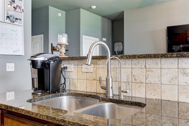 2500 SE 93rd St, Moore, OK 73160 - kitchen featuring dark stone counters and decorative backsplash