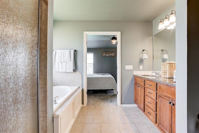 2500 SE 93rd St, Moore, OK 73160 - ensuite bathroom with double vanity, a garden tub, ceiling fan, and tile patterned floors
